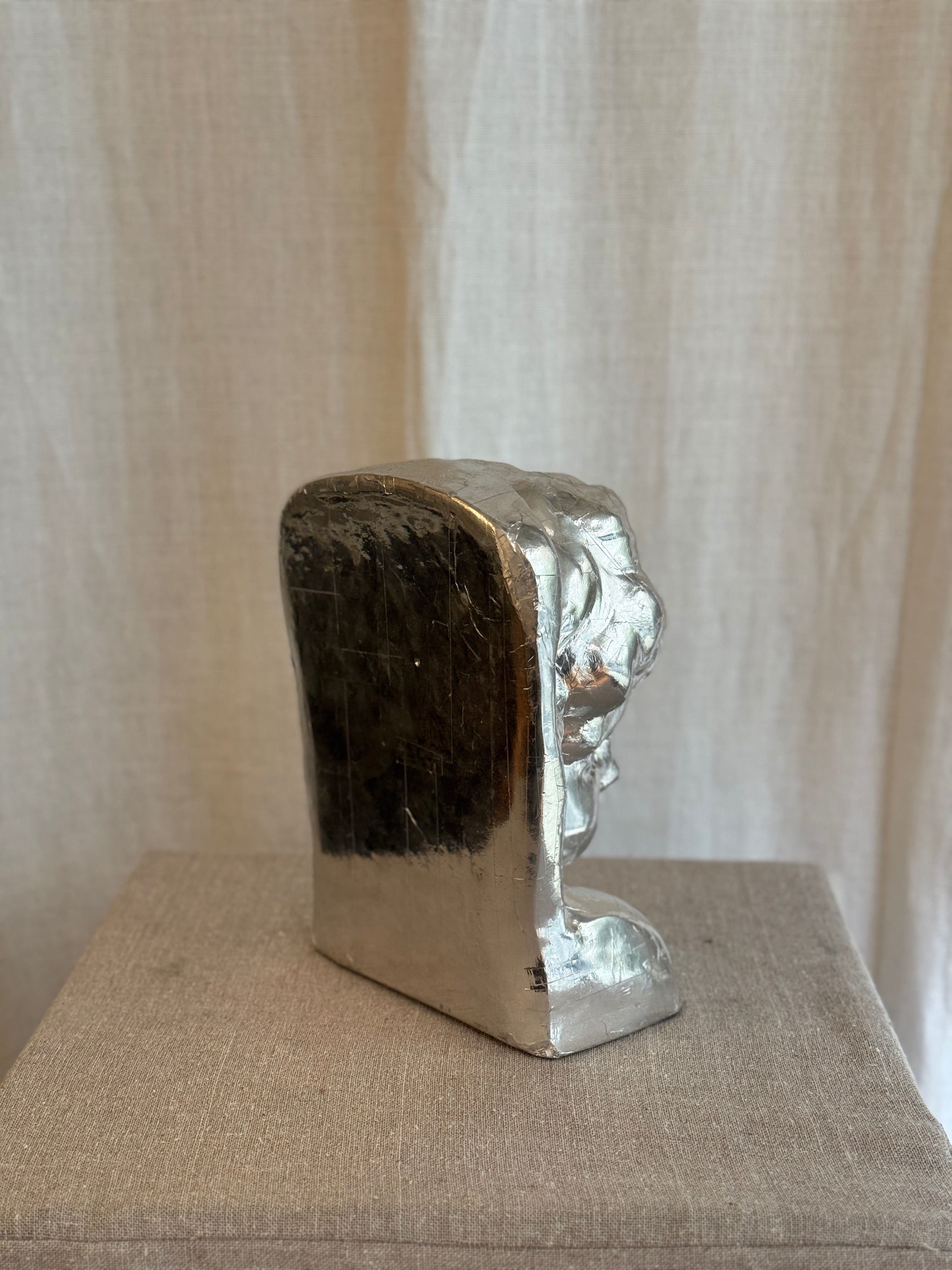 Byste / Bokstøtte i Sølve