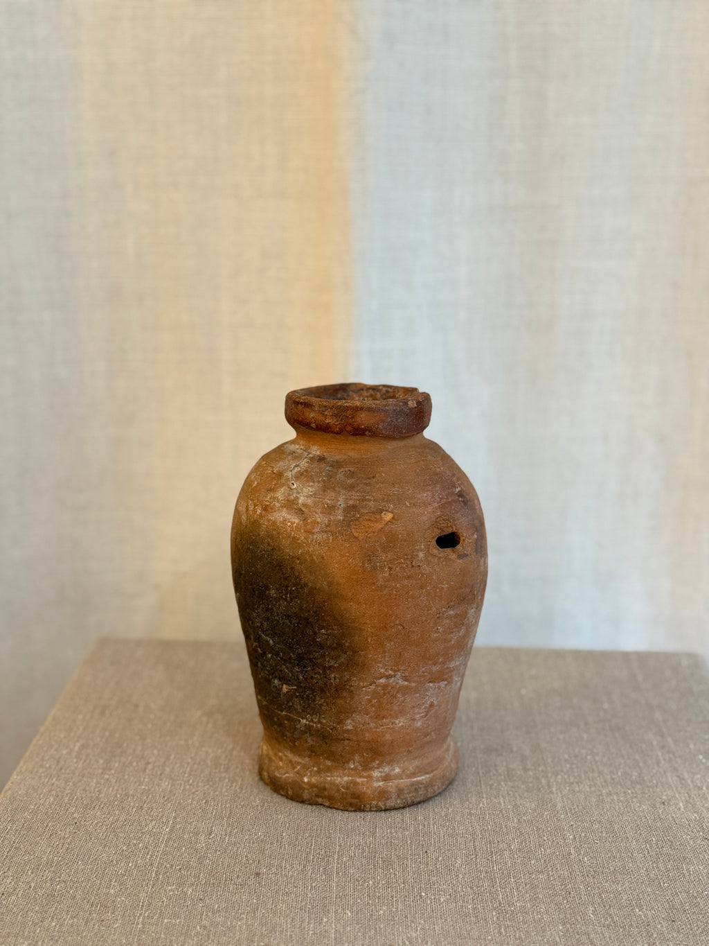 Liten Terrakotta Krukke