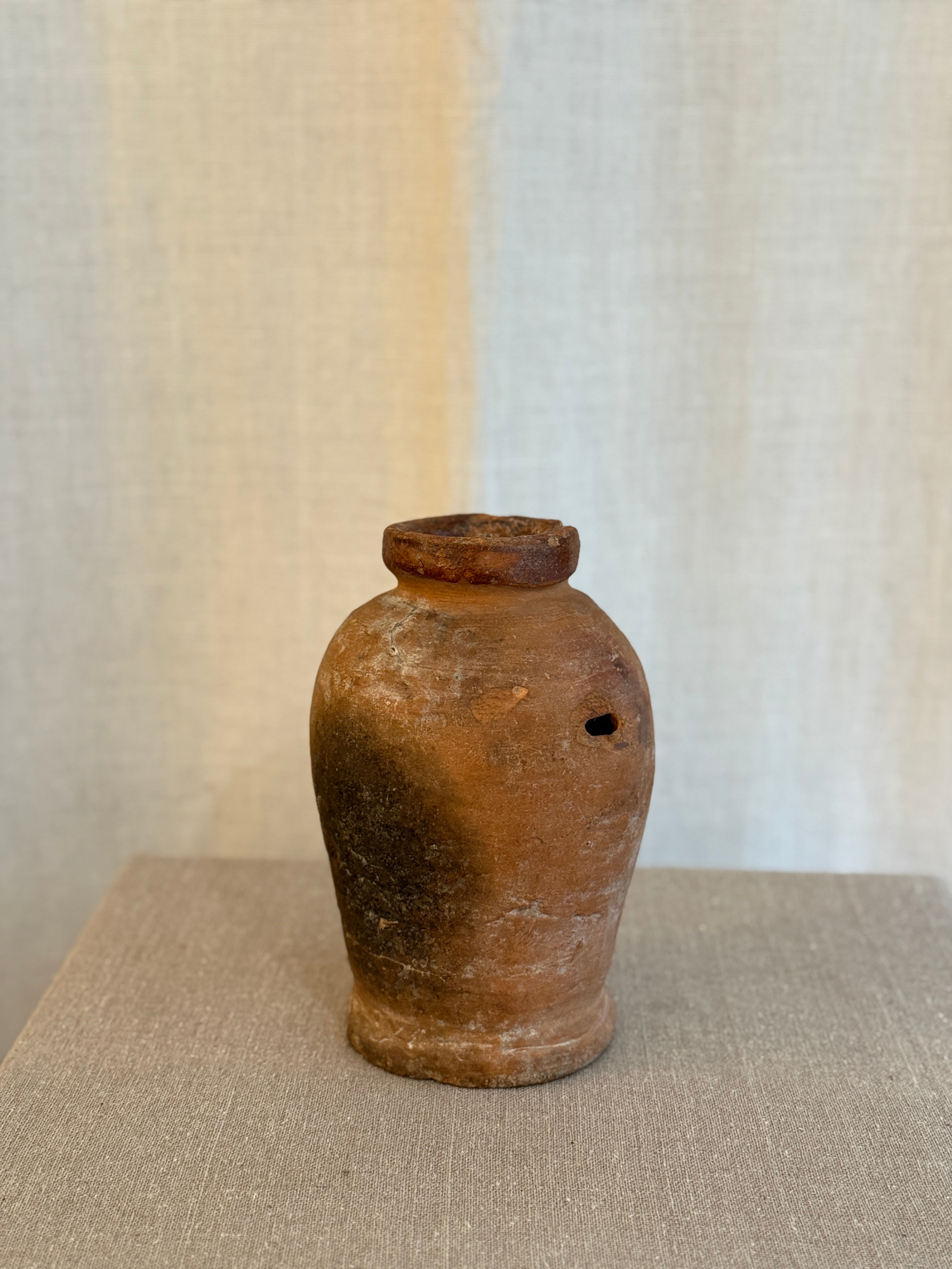 Liten Terrakotta Krukke