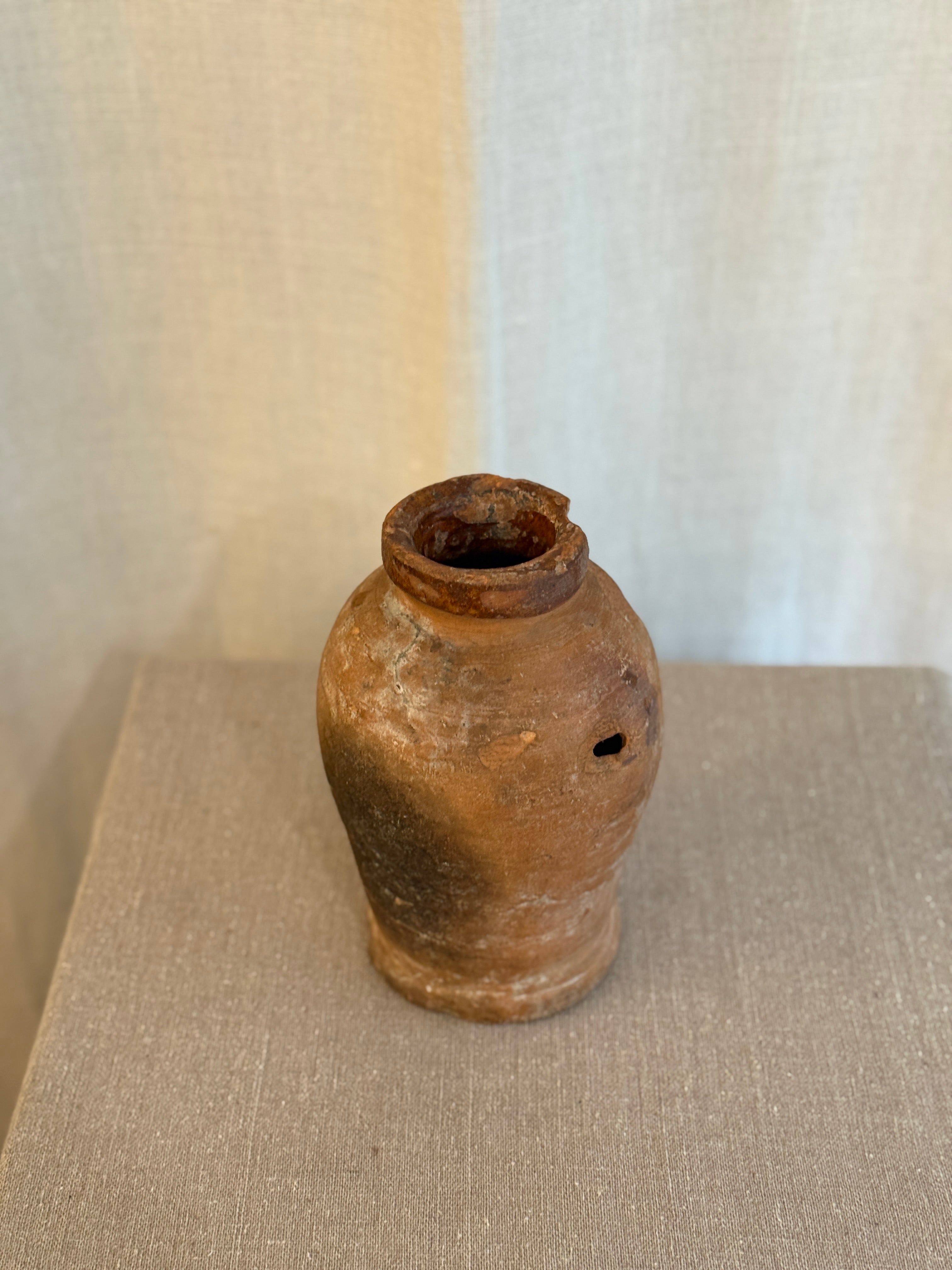 Liten Terrakotta Krukke