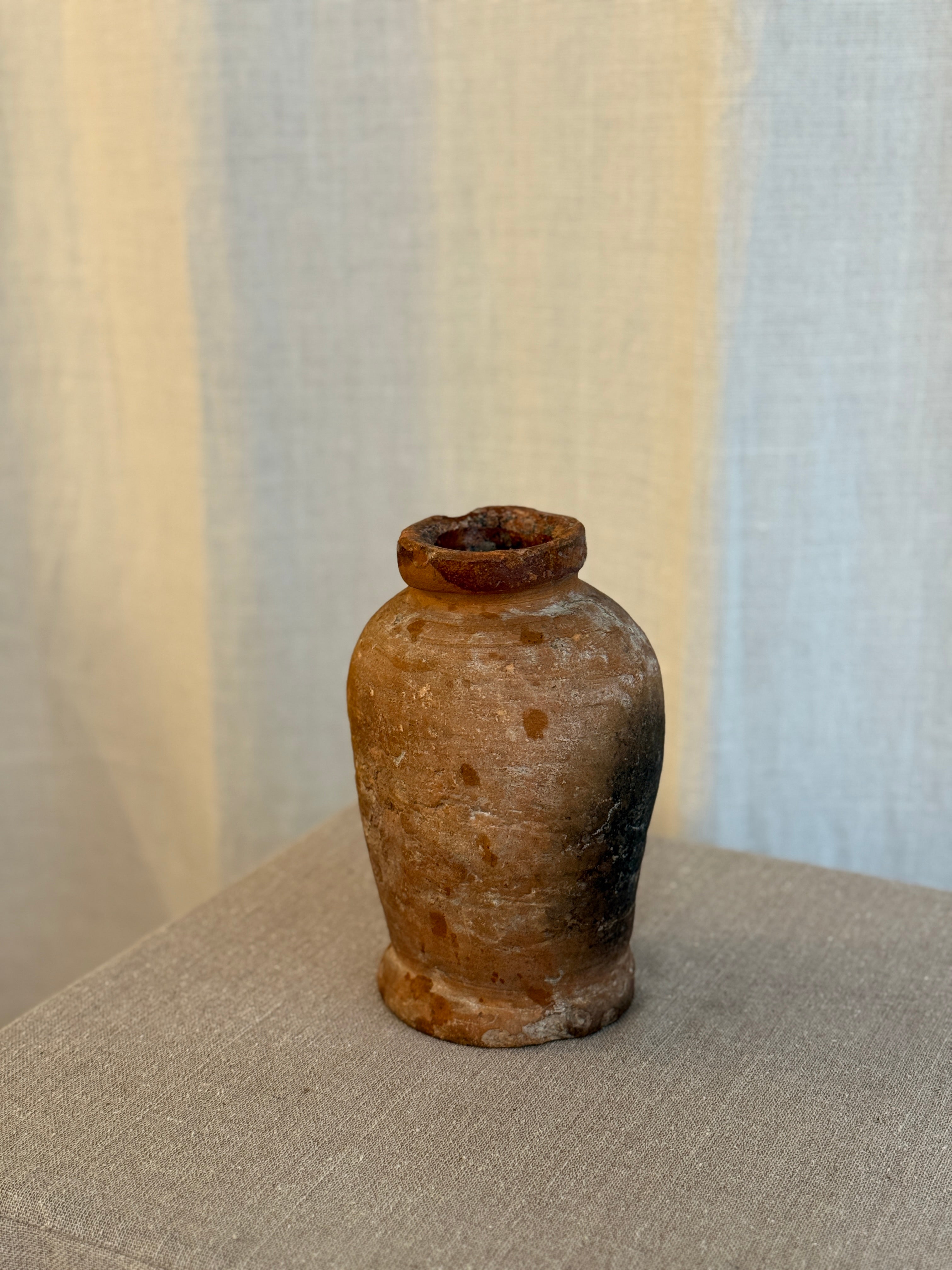 Liten Terrakotta Krukke